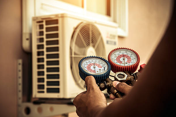 Professional Air Conditioning Service technician working in Manchester, CT